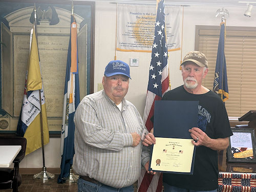 Chaplain Shawn Tully presents Registrar Dennis Beckham with his Flag Certificate at our regular scheduled meeting on March 12, 2024.